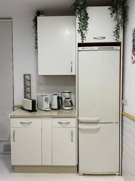Kuchyň nebo kuchyňský kout v ubytování Home Away From Home Marbella