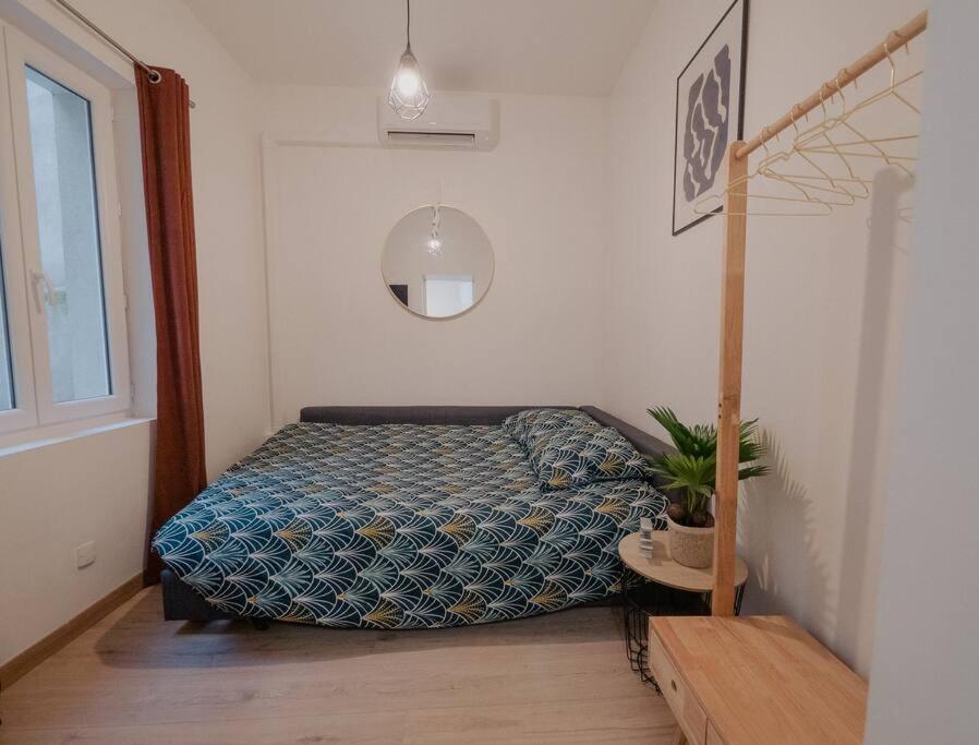 Posteľ alebo postele v izbe v ubytovaní L’Écrin Nîmes - Le Cocoon Dorée