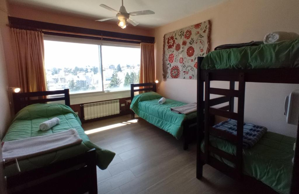 Postel nebo postele na pokoji v ubytování Hospedaje Penthouse 1004