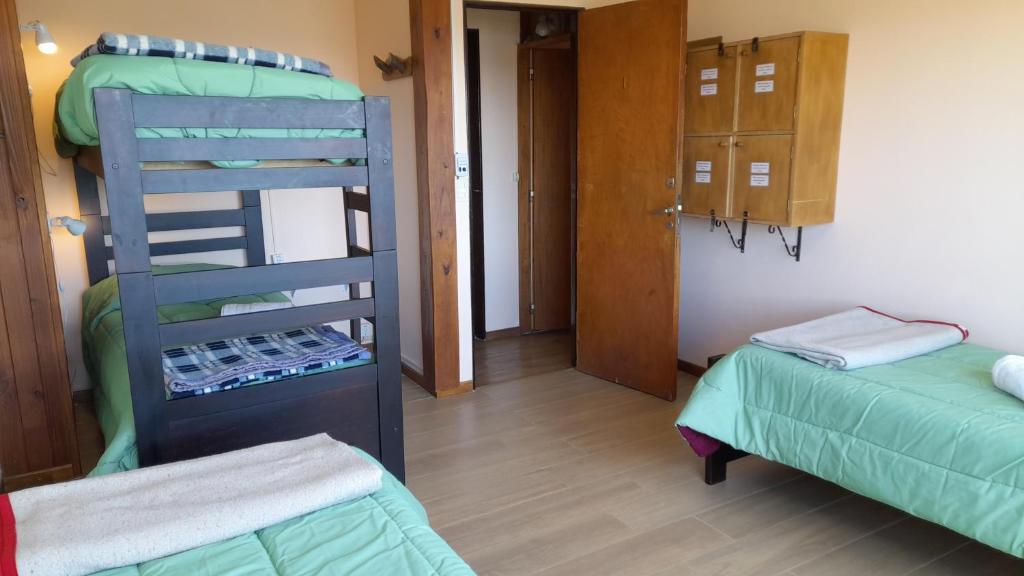 Postel nebo postele na pokoji v ubytování Hospedaje Penthouse 1004