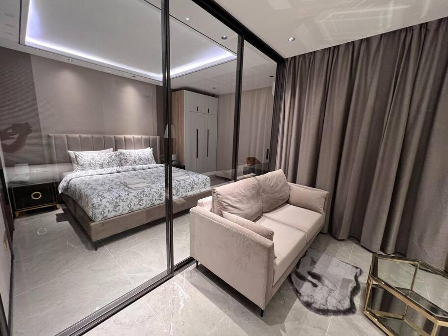 Postel nebo postele na pokoji v ubytování Glory Condominium กลอรี่คอนโด เชียงใหม่