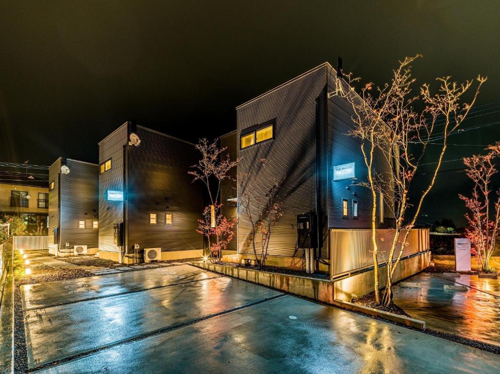 a rendering of a building at night at Rakuten STAY HOUSE x WILL STYLE Yufuin Kawakami 101 in Yufuin
