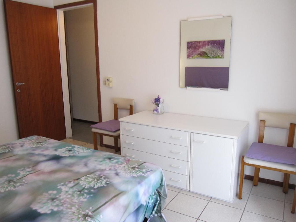 A bed or beds in a room at Modern flat at Grado Pineda - Beahost Rentals