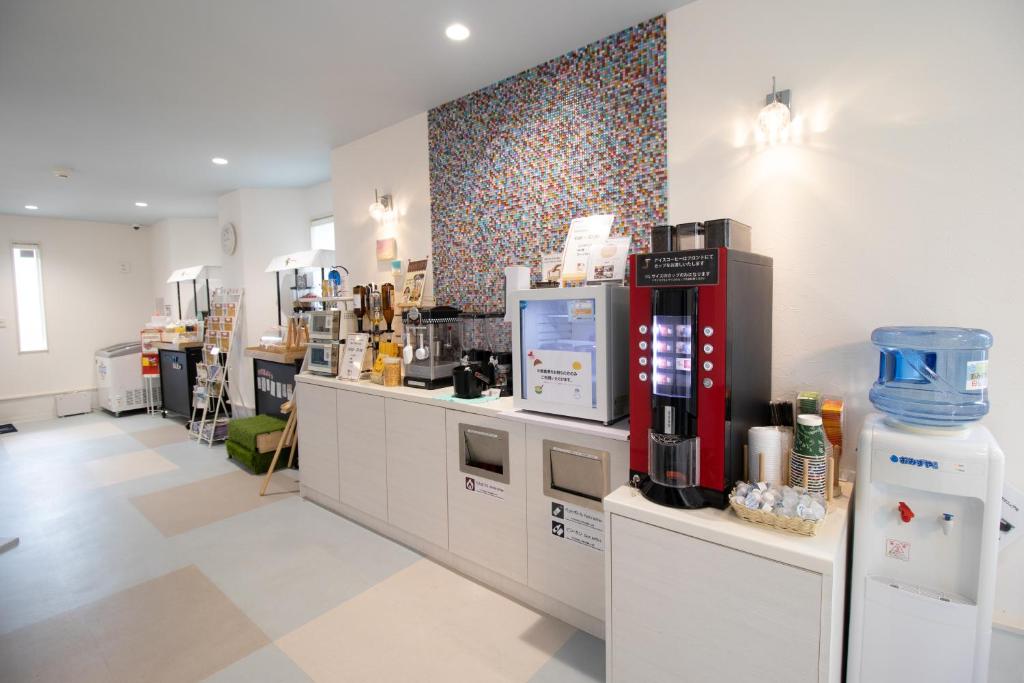 a coffee shop with aasteryasteryasteryasteryasteryasteryasteryasteryasteryasteryastery at Hotel Santa Barbara Miyakojima Resort in Miyako-jima