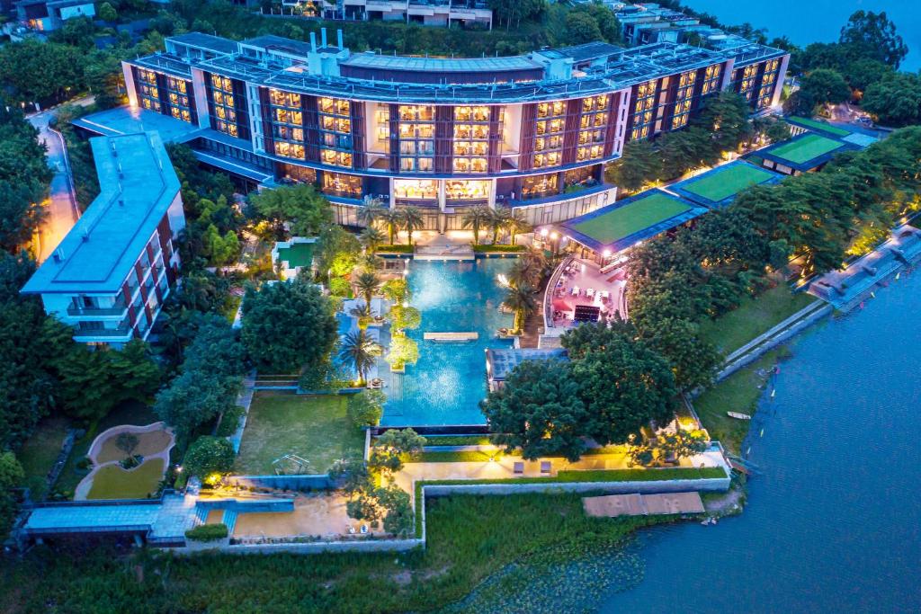 an aerial view of a hotel with a swimming pool at The Yun Resort QingYuan in Qingyuan