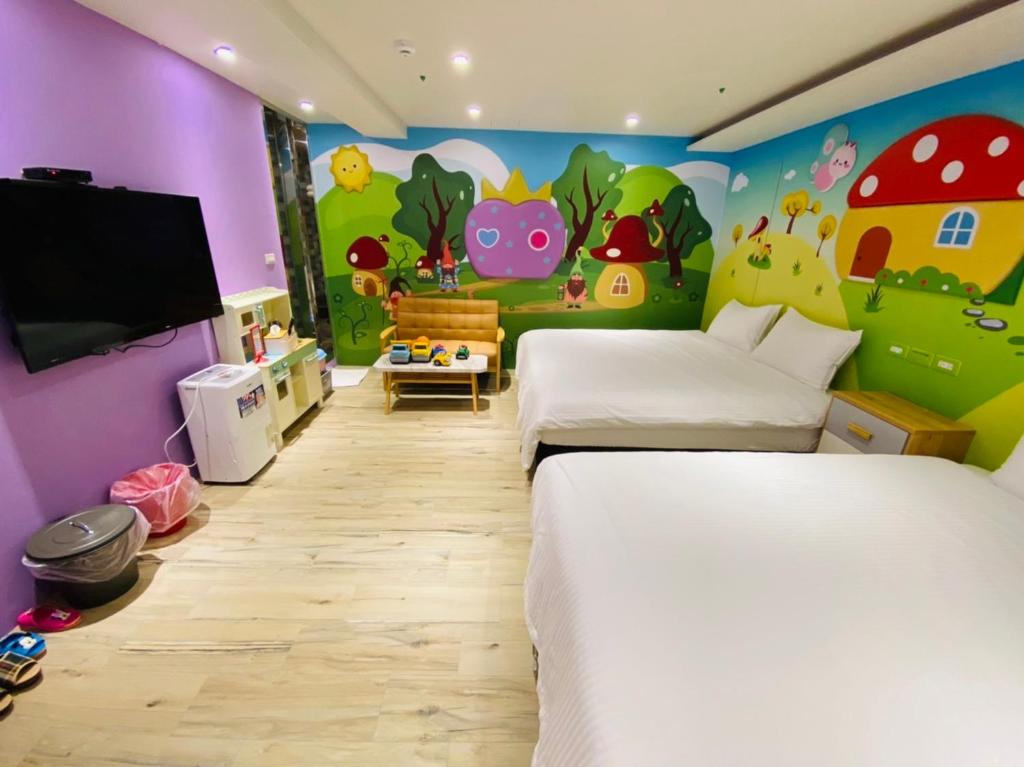 TV a/nebo společenská místnost v ubytování Have Fun Hotel