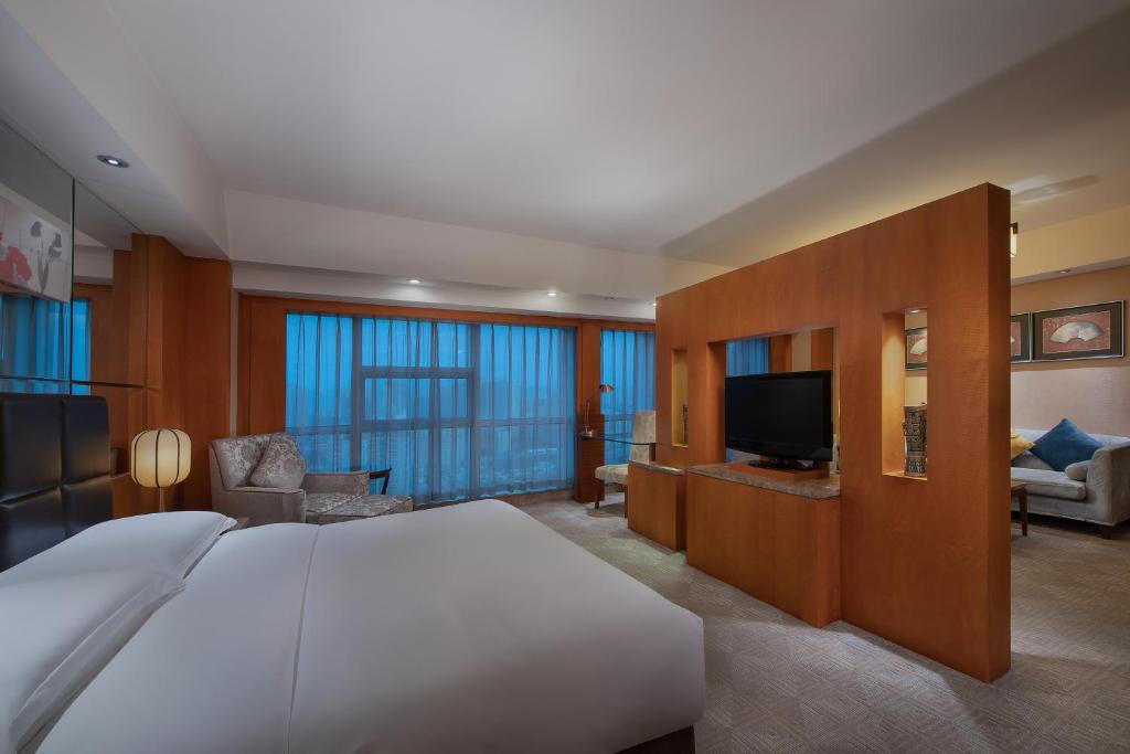 TV a/nebo společenská místnost v ubytování Empark Grand Hotel Xi'an