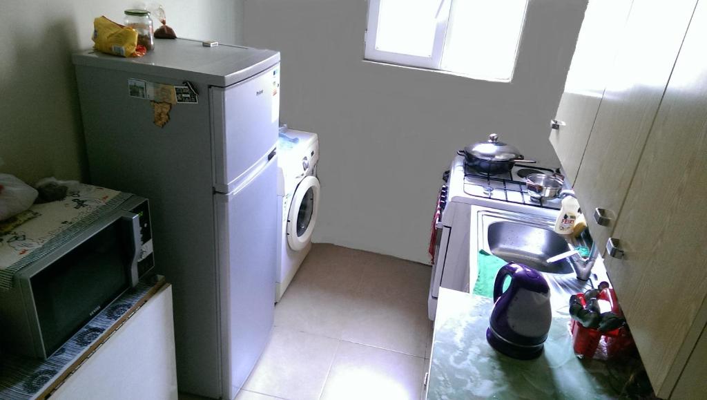 Kuchyň nebo kuchyňský kout v ubytování Comfort Plus