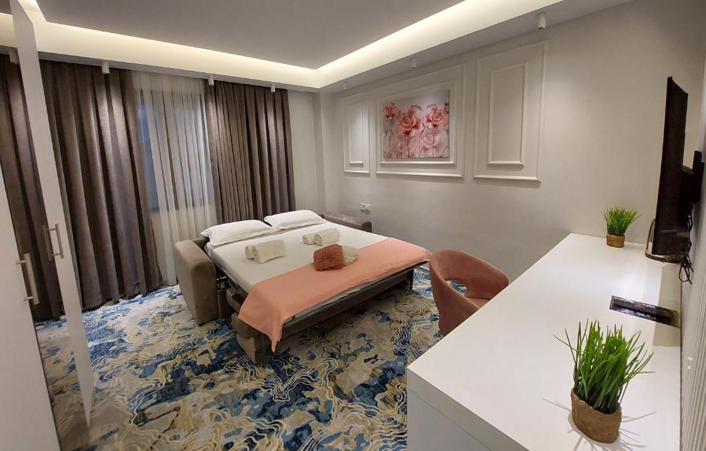 Postel nebo postele na pokoji v ubytování Apartments Jordan Luxury - Gevgelija