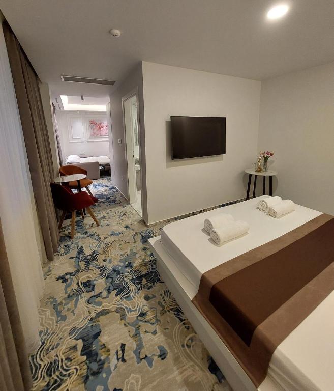 Postel nebo postele na pokoji v ubytování Apartments Jordan Luxury - Gevgelija