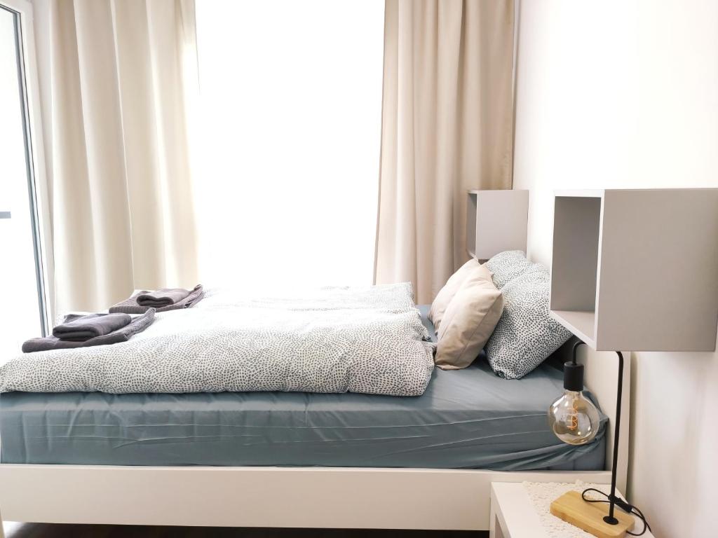 Posteľ alebo postele v izbe v ubytovaní Mogilska 120D by Homeprime