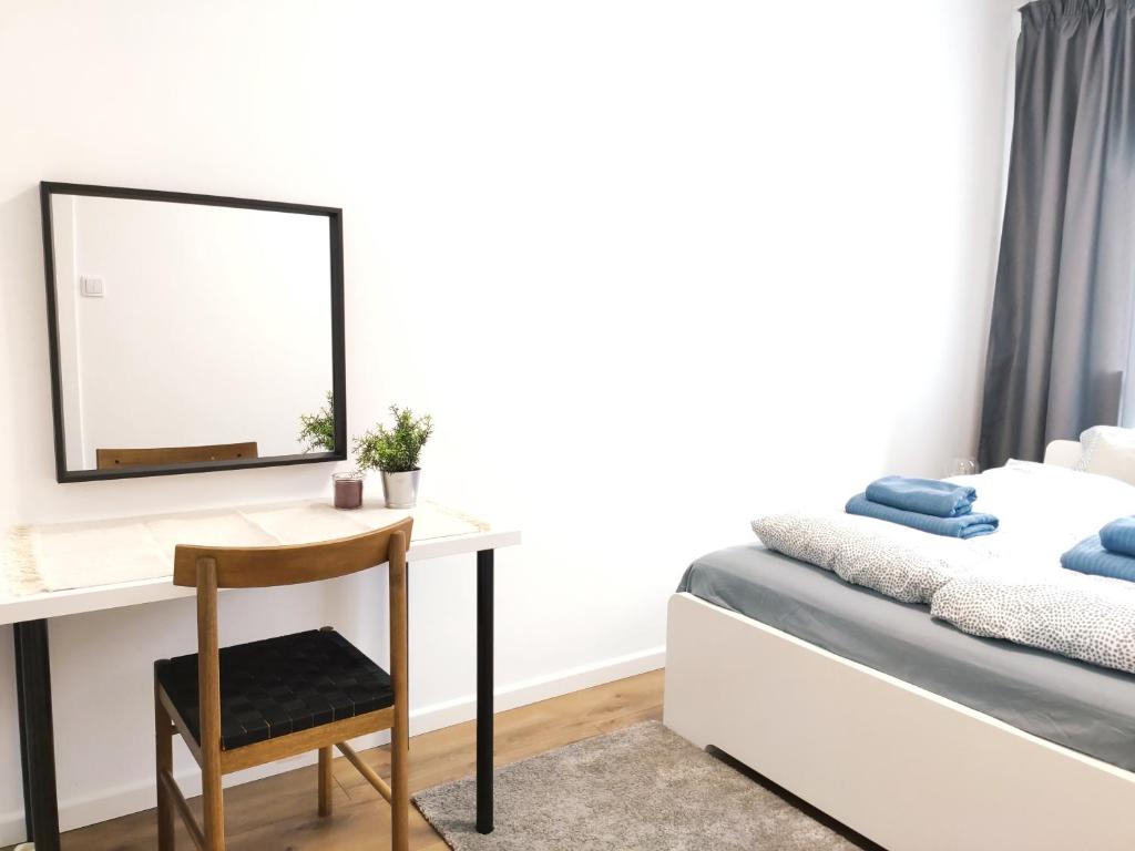 Posteľ alebo postele v izbe v ubytovaní Mogilska 120D by Homeprime