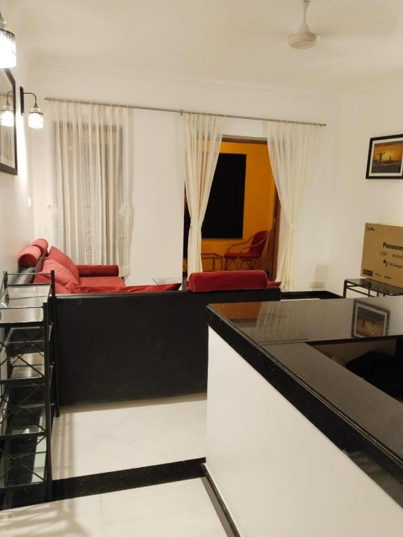 Posezení v ubytování Riviera palms 1 Luxury 1 BHK apartment with Swimmimg Pool view- Arpora - near baga beach