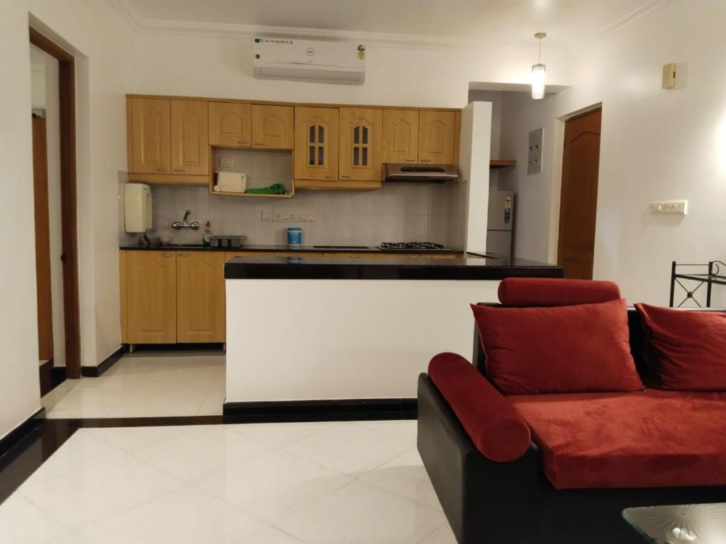 Kuchyň nebo kuchyňský kout v ubytování Riviera palms 1 Luxury 1 BHK apartment with Swimmimg Pool view- Arpora - near baga beach