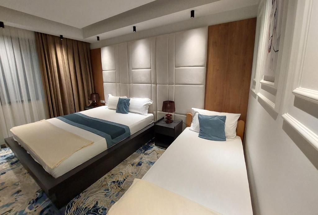 Postel nebo postele na pokoji v ubytování Apartments Jordan Luxury - Gevgelija