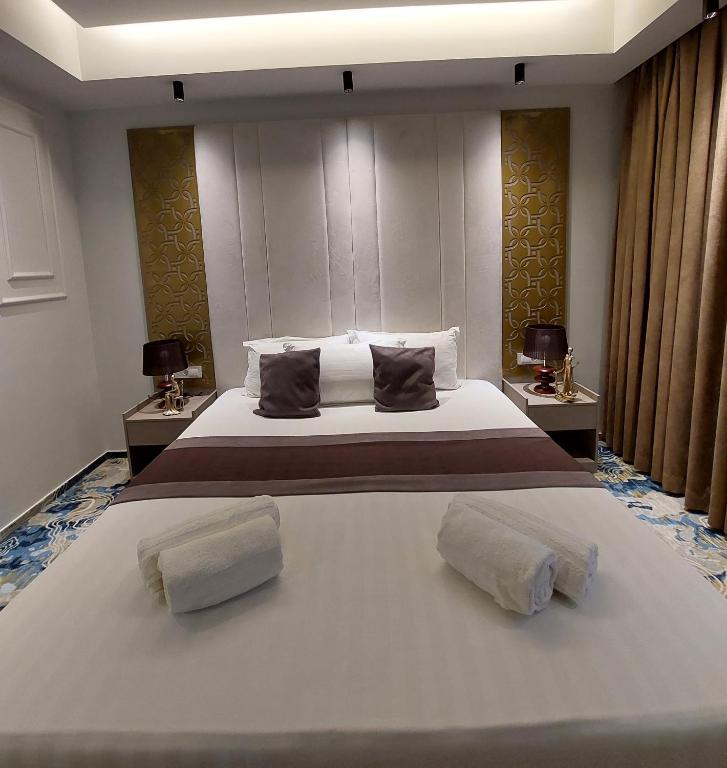 Postel nebo postele na pokoji v ubytování Apartments Jordan Luxury - Gevgelija