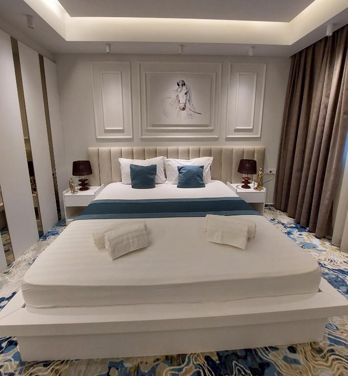 Postel nebo postele na pokoji v ubytování Apartments Jordan Luxury - Gevgelija