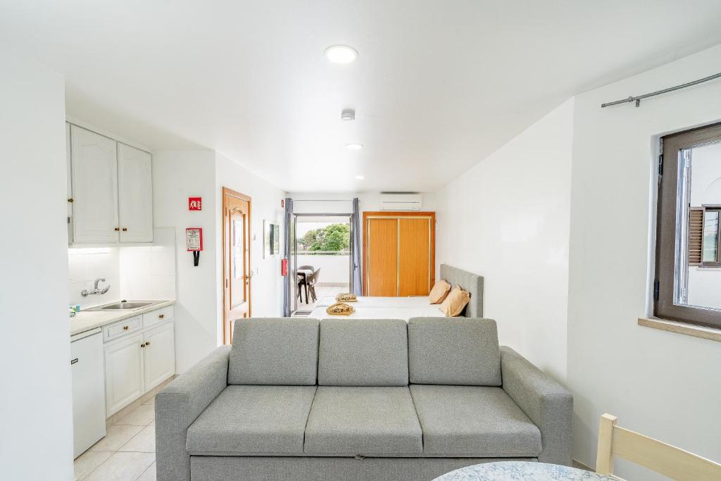 Posezení v ubytování Apartamentos Vale de Carros by Umbral