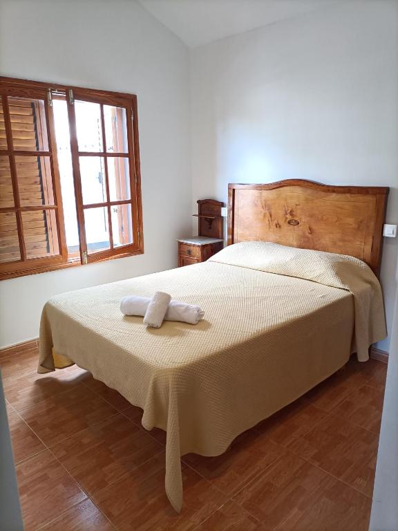 A bed or beds in a room at Chalet Juana La Concha Valle de Agaete