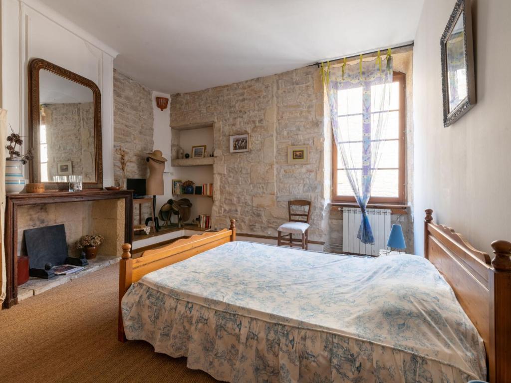 Postel nebo postele na pokoji v ubytování Apartment Belles Pierres by Interhome