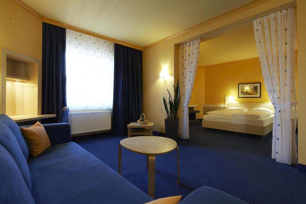 Vuode tai vuoteita majoituspaikassa IntercityHotel Kassel