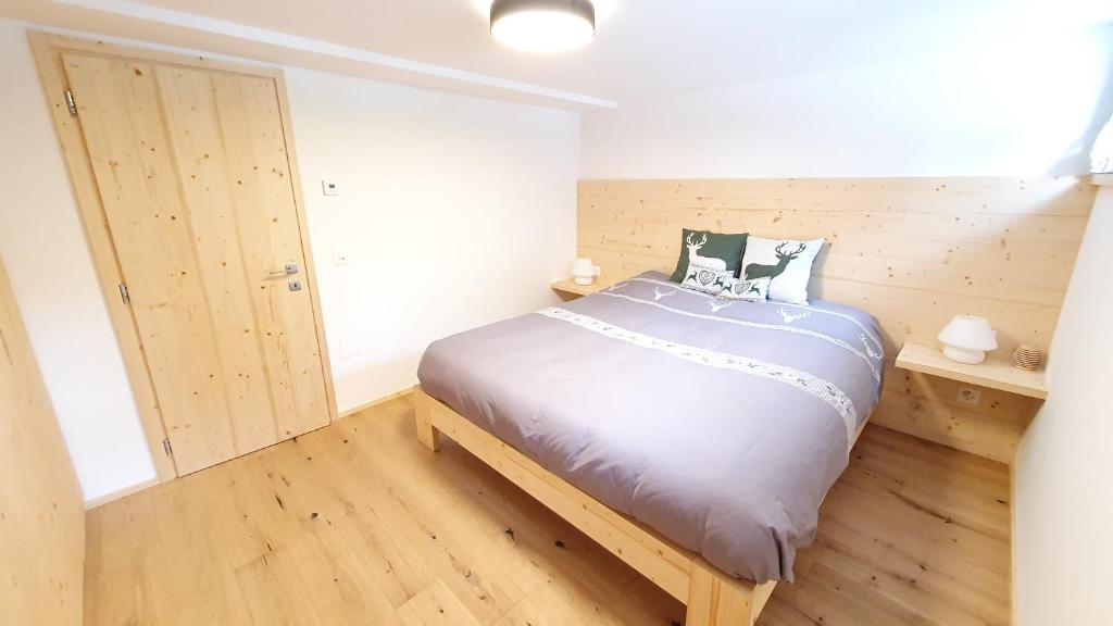 Postel nebo postele na pokoji v ubytování Yeti Lodge