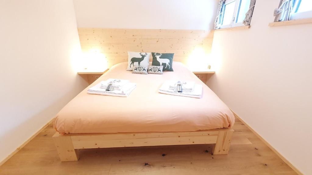 Postel nebo postele na pokoji v ubytování Yeti Lodge