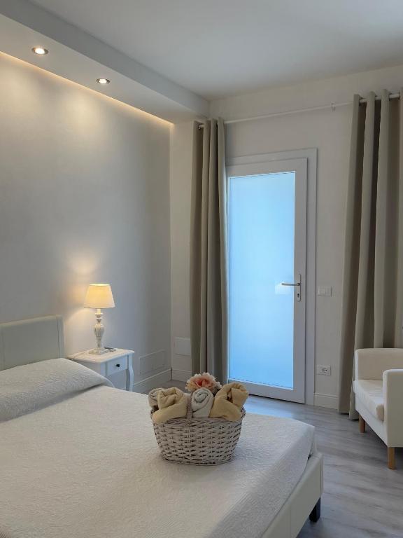 Postel nebo postele na pokoji v ubytování Villa Pensione Mercedes