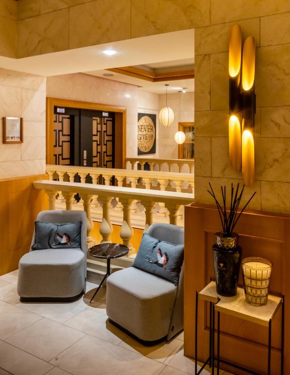 Posezení v ubytování Hotel Le Châtelain