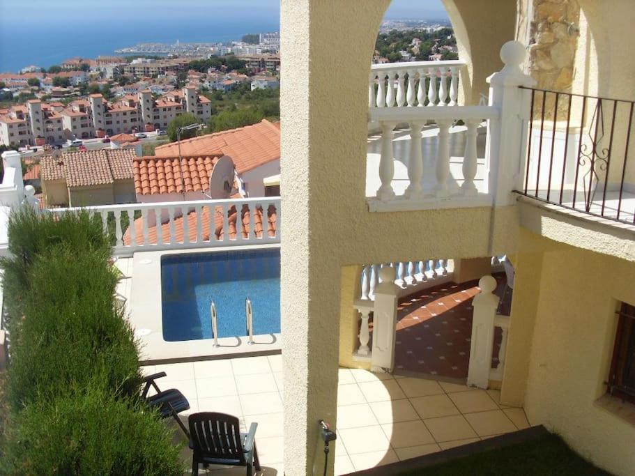 a view of a balcony of a building with a swimming pool at Chalet en Alcossebre in Alcossebre