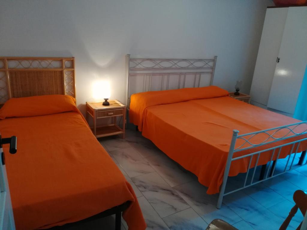 A bed or beds in a room at Le Querce Santa Cesarea Terme