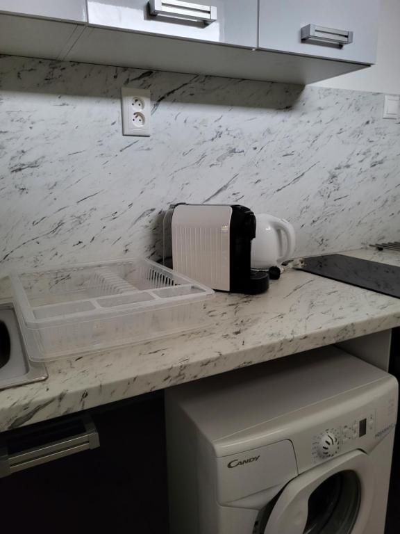 Kuchyň nebo kuchyňský kout v ubytování Apartmány EMMA