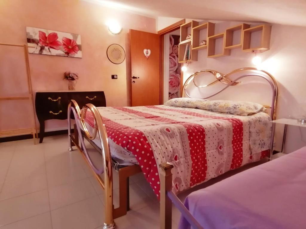 Postel nebo postele na pokoji v ubytování B&B Milu'