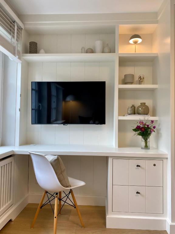 TV a/nebo společenská místnost v ubytování Süderhygge