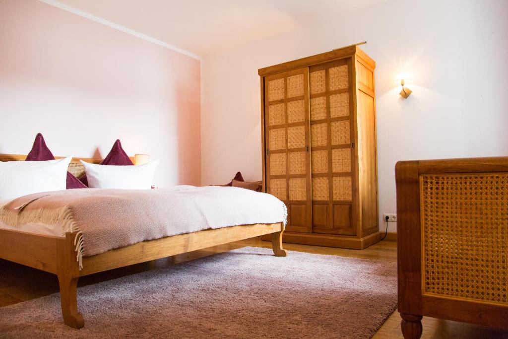 Postel nebo postele na pokoji v ubytování Seehotel Luitpold