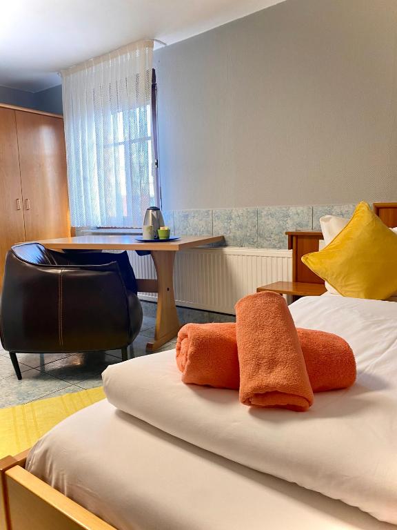 Postel nebo postele na pokoji v ubytování M-Hotel