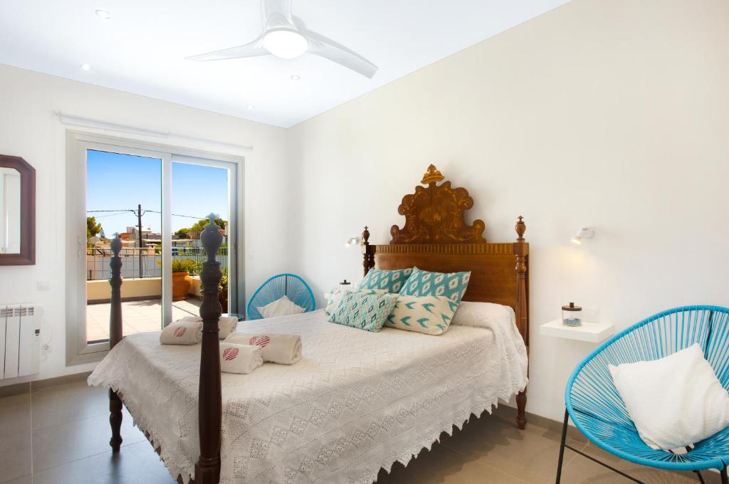 A bed or beds in a room at Villa Toya