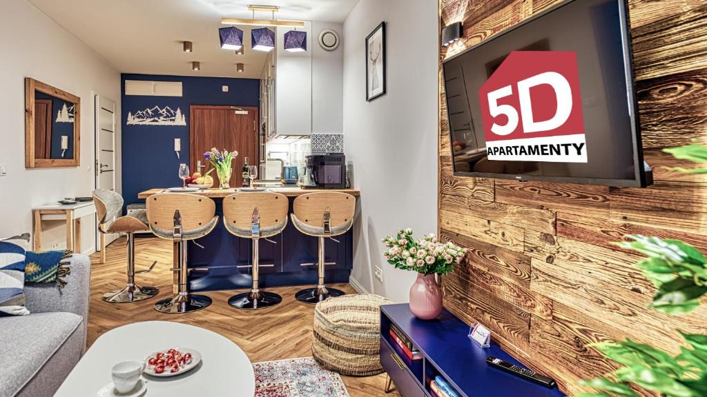 Televízia a/alebo spoločenská miestnosť v ubytovaní Apartament A2 DOMiTU z Basenem, Sauną, Jacuzzi - 5D Apartments