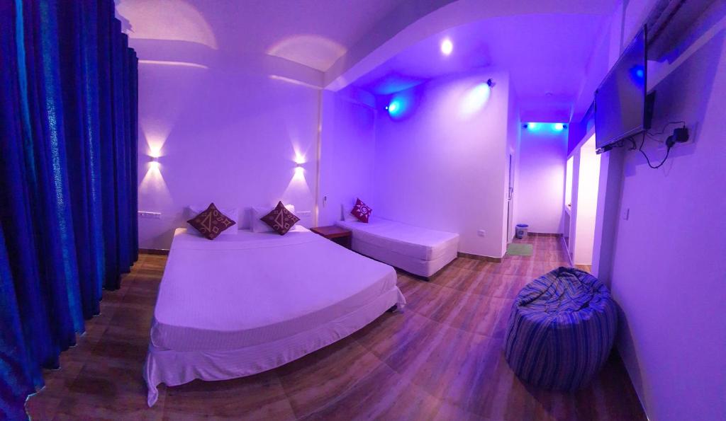 Postel nebo postele na pokoji v ubytování Dinuda Resort