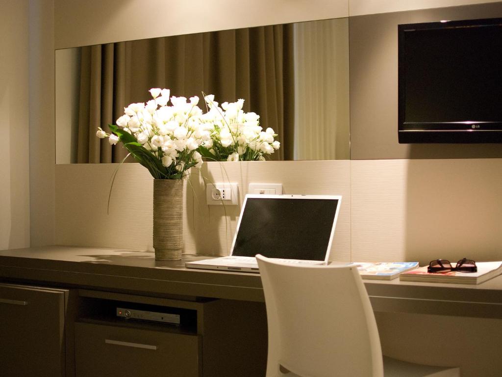 TV a/nebo společenská místnost v ubytování Hotel Cube