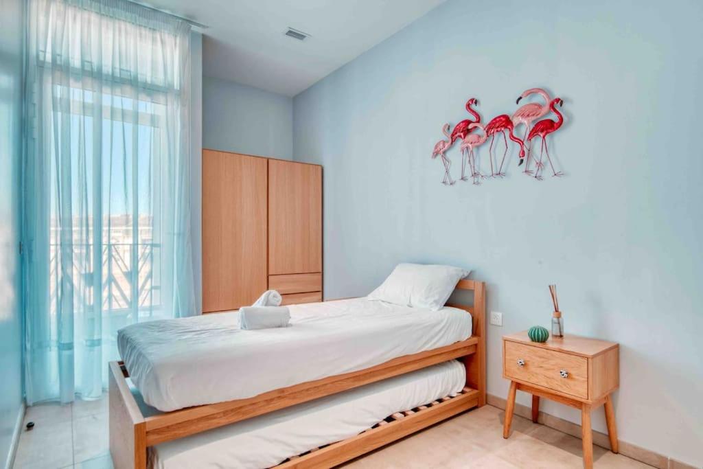 Posteľ alebo postele v izbe v ubytovaní Luxury Apartment Joliette
