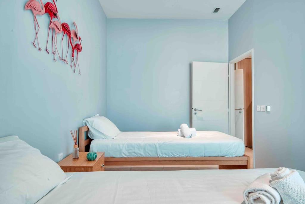 Posteľ alebo postele v izbe v ubytovaní Luxury Apartment Joliette