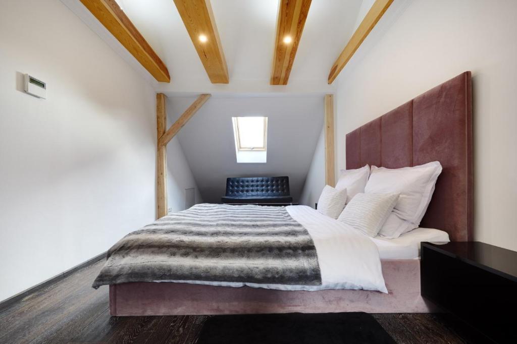 Posteľ alebo postele v izbe v ubytovaní Apartament Heaven