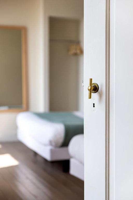 Postel nebo postele na pokoji v ubytování Vakantiewoning De Papaver