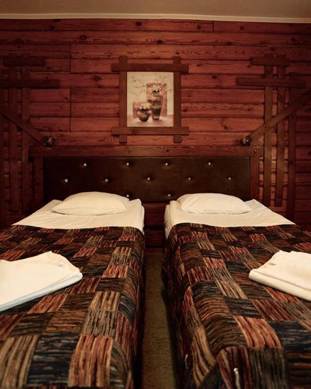 Postel nebo postele na pokoji v ubytování IZKI Eco Resort