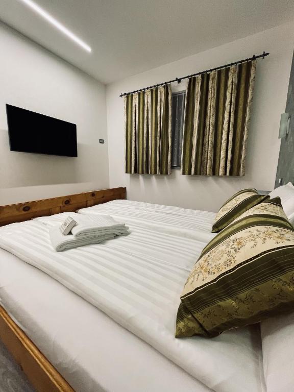 Postel nebo postele na pokoji v ubytování B&B L'Aigual