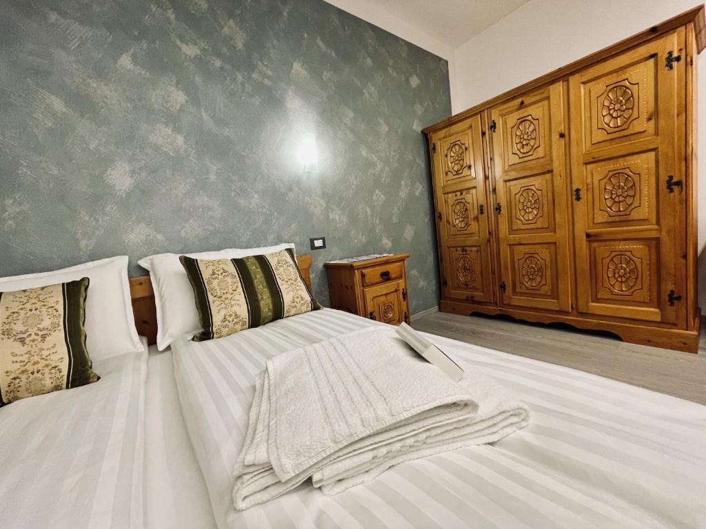 Postel nebo postele na pokoji v ubytování B&B L'Aigual