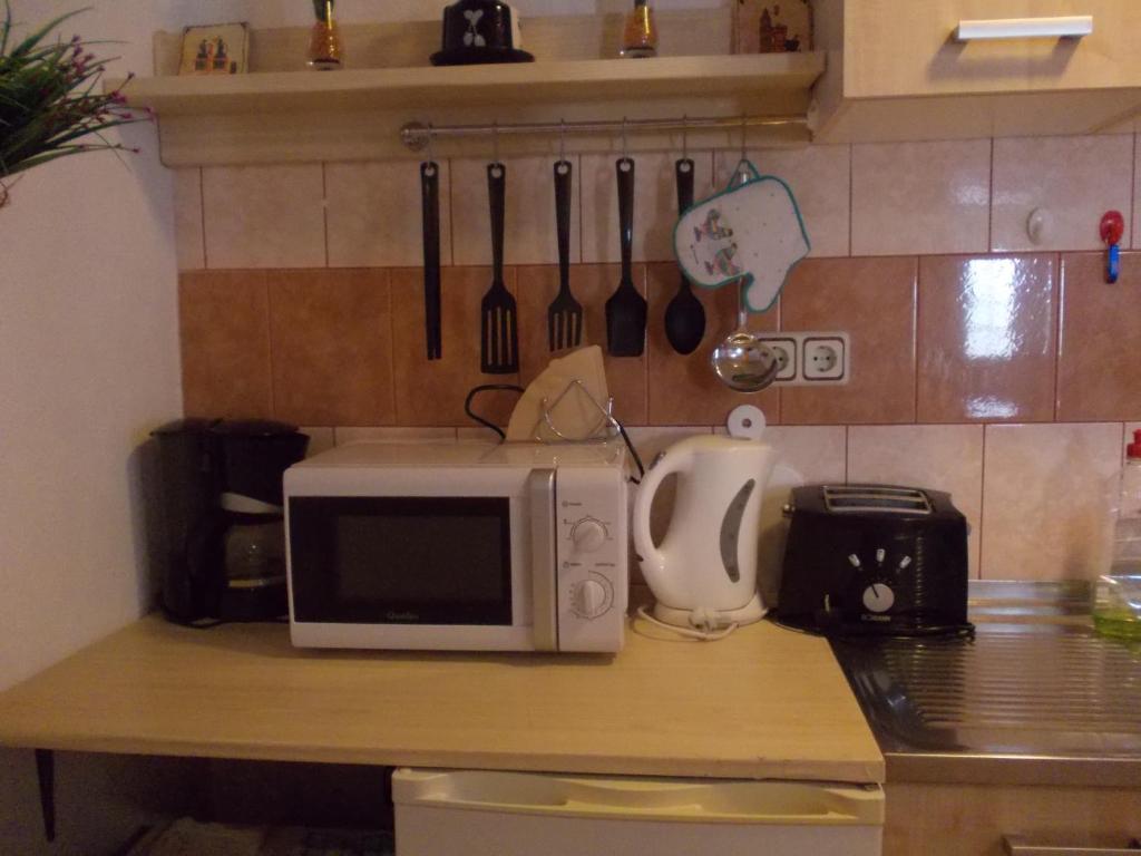 Kuchyň nebo kuchyňský kout v ubytování Apartments Pavlić