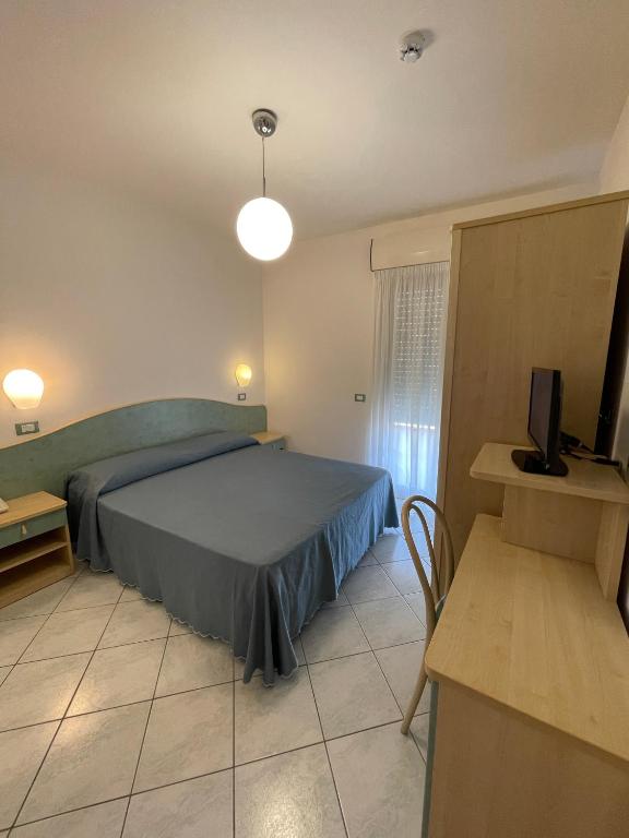 Postel nebo postele na pokoji v ubytování Albergo Désirée 2