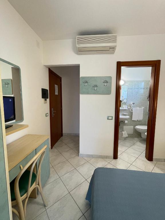Postel nebo postele na pokoji v ubytování Albergo Désirée 2